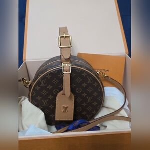 Louis Vuitton Petite Boîte Chapeau bag in classic coated Monogram canvas